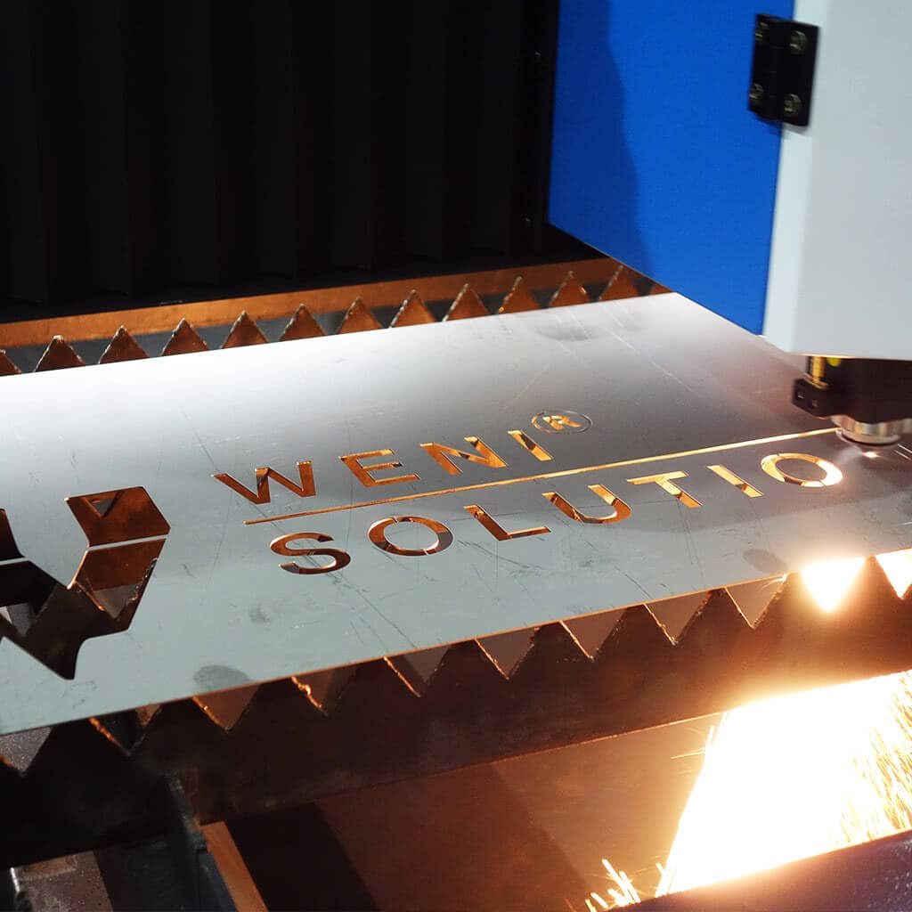 Fibre laser - Weni Solution logo cutting
